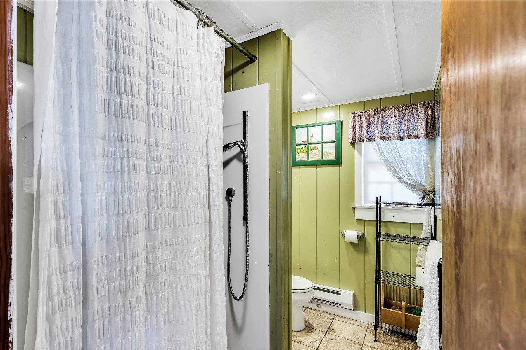 22 Edwards Road Dennis Port, MA 02639 - Photo 33 of 40 a bathroom with a mirror and a shower