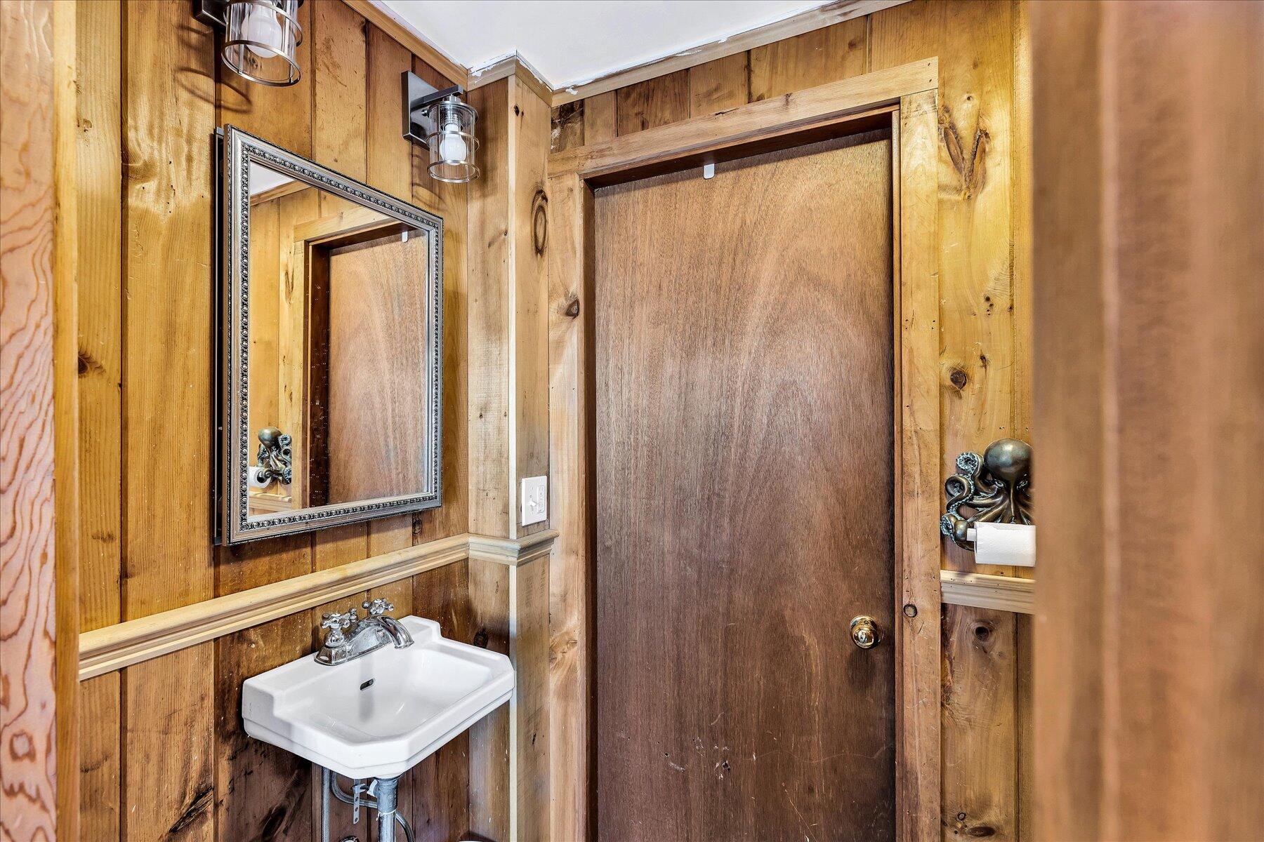 22 Edwards Road Dennis Port, MA 02639 - Photo 37 of 40 a bathroom with a sink and mirror