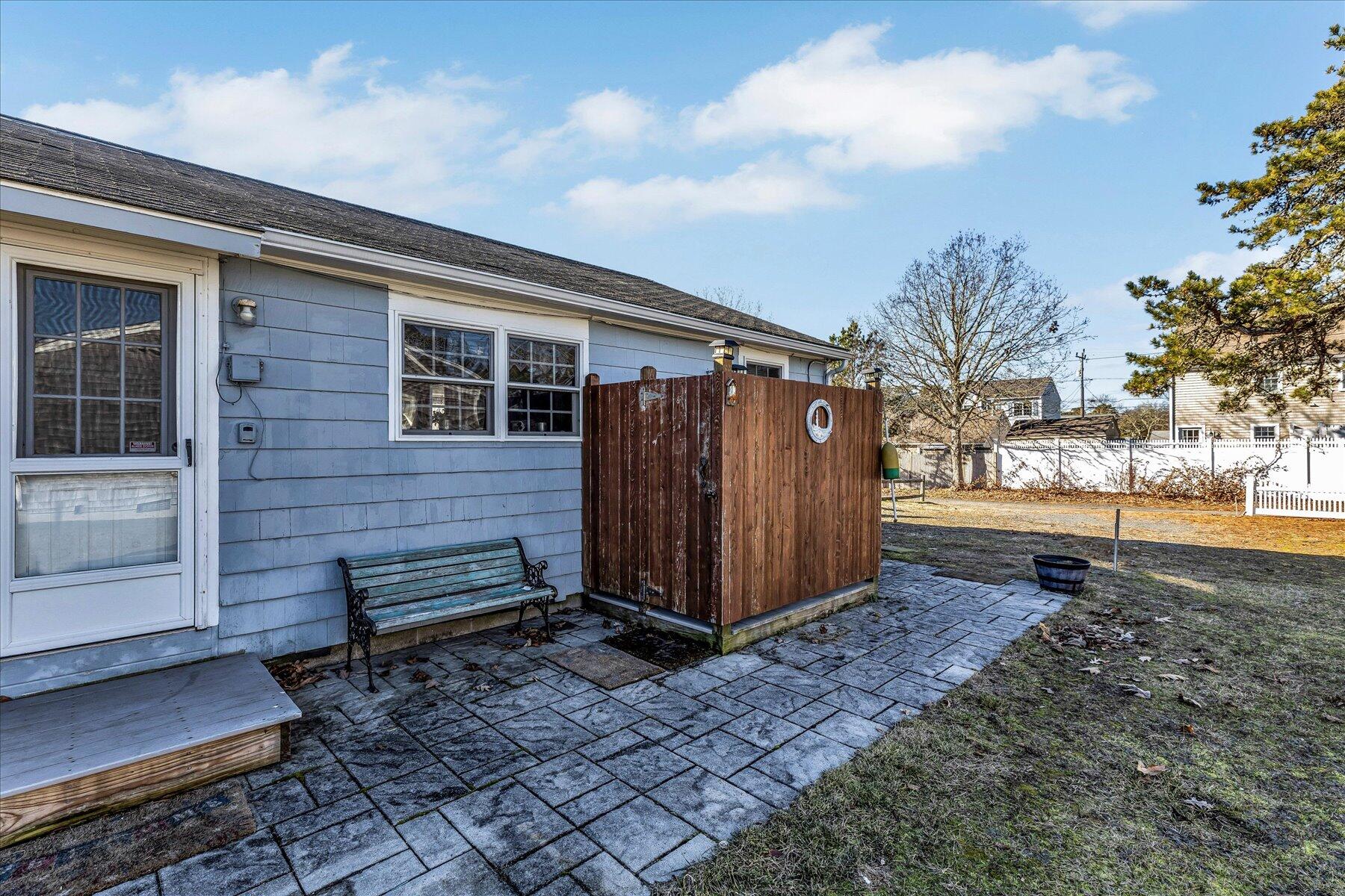 22 Edwards Road Dennis Port, MA 02639 - Photo 10 of 40 a view of a backyard with pathway