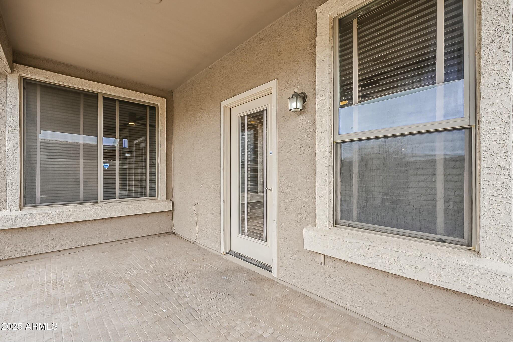 10122 West Payson Road Tolleson, AZ 85353 - Photo 46 of 56 a view of front door of house
