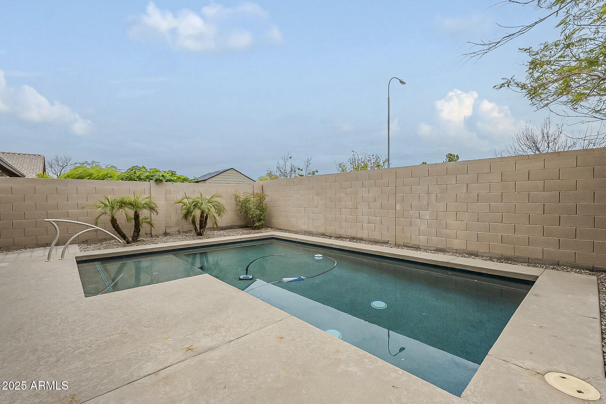 10122 West Payson Road Tolleson, AZ 85353 - Photo 54 of 56 a view of outdoor space and barbecue grill