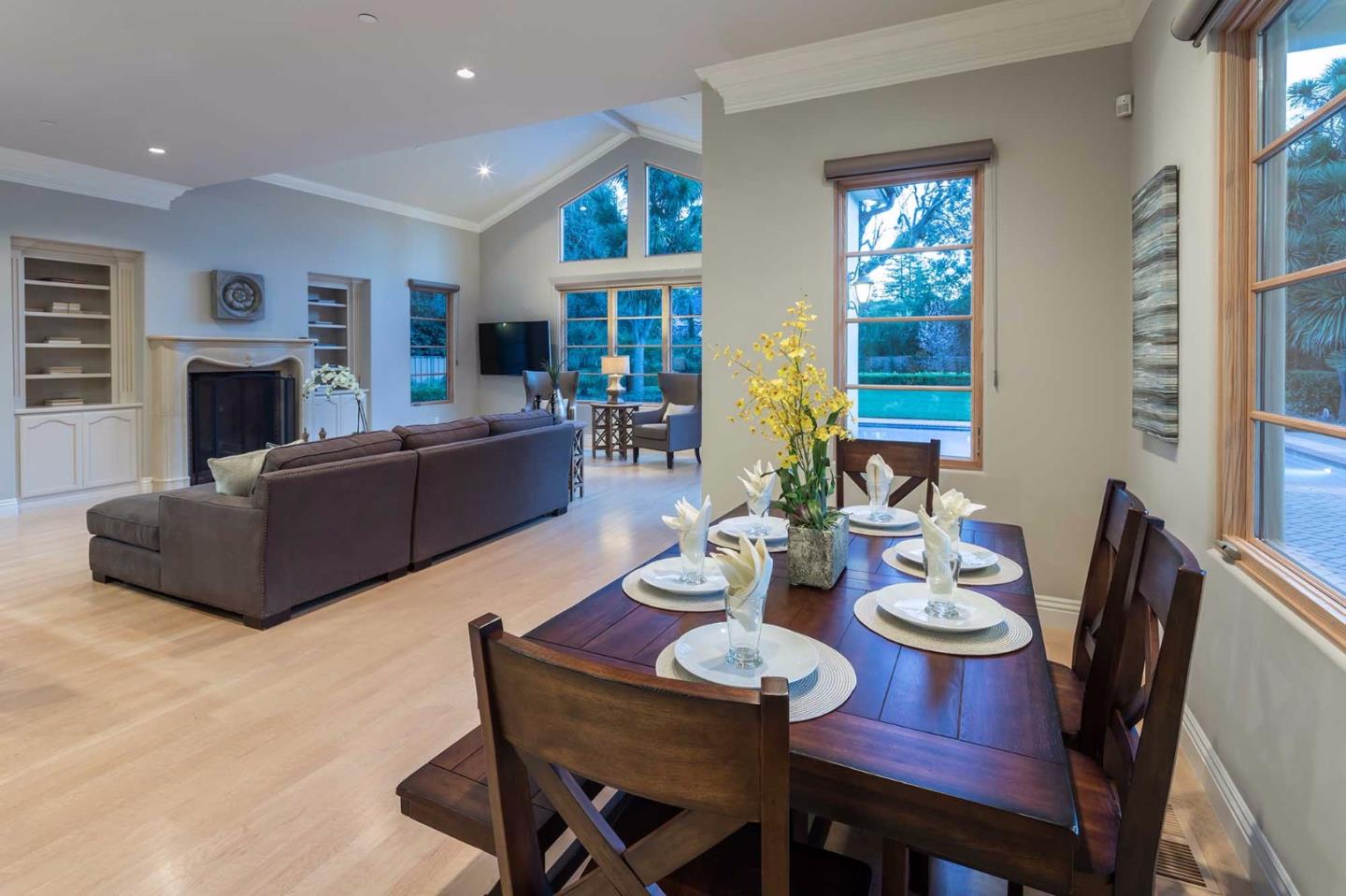 84 Nora Way Atherton, CA 94027 - Photo 14 of 37 a living room with fireplace furniture and a wooden floor