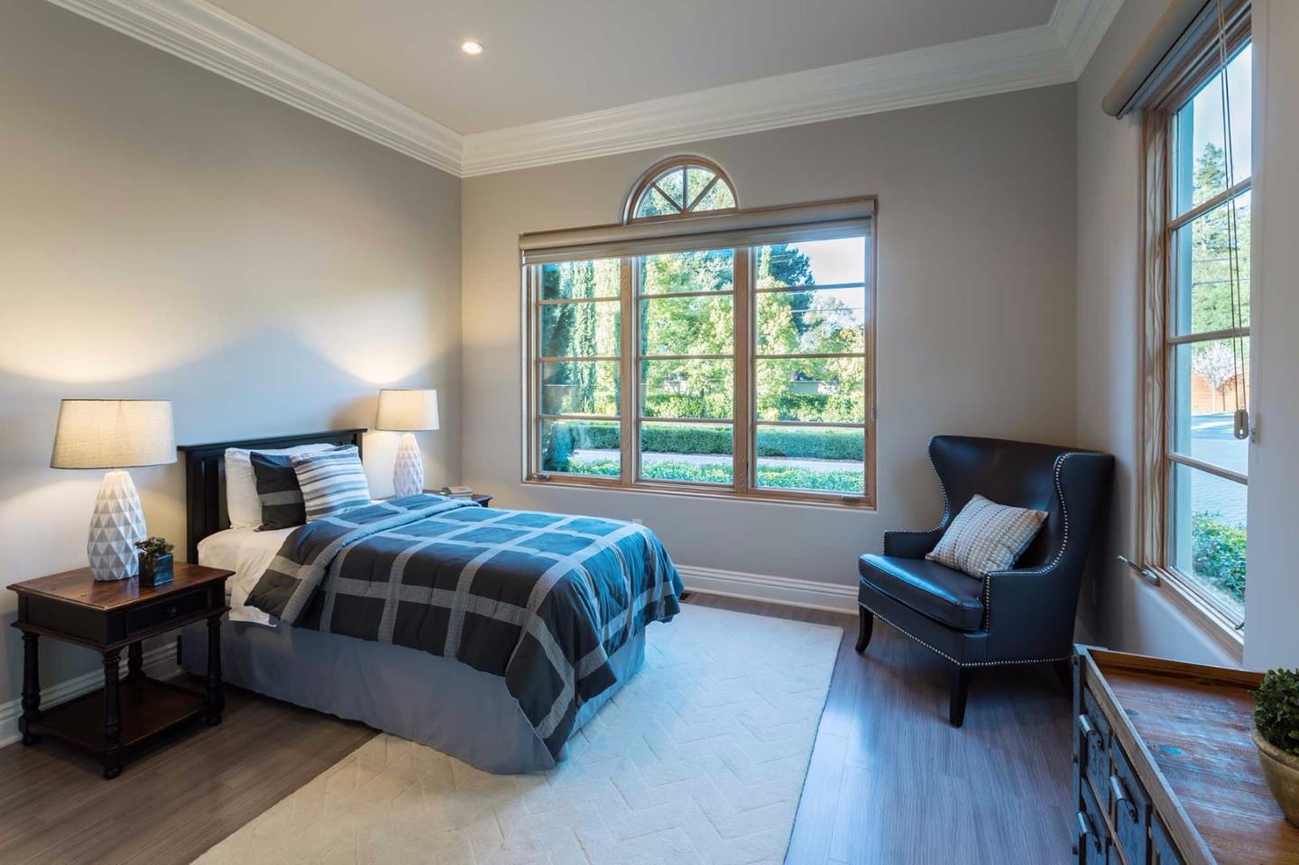 84 Nora Way Atherton, CA 94027 - Photo 19 of 37 a bedroom with a bed and wooden floor