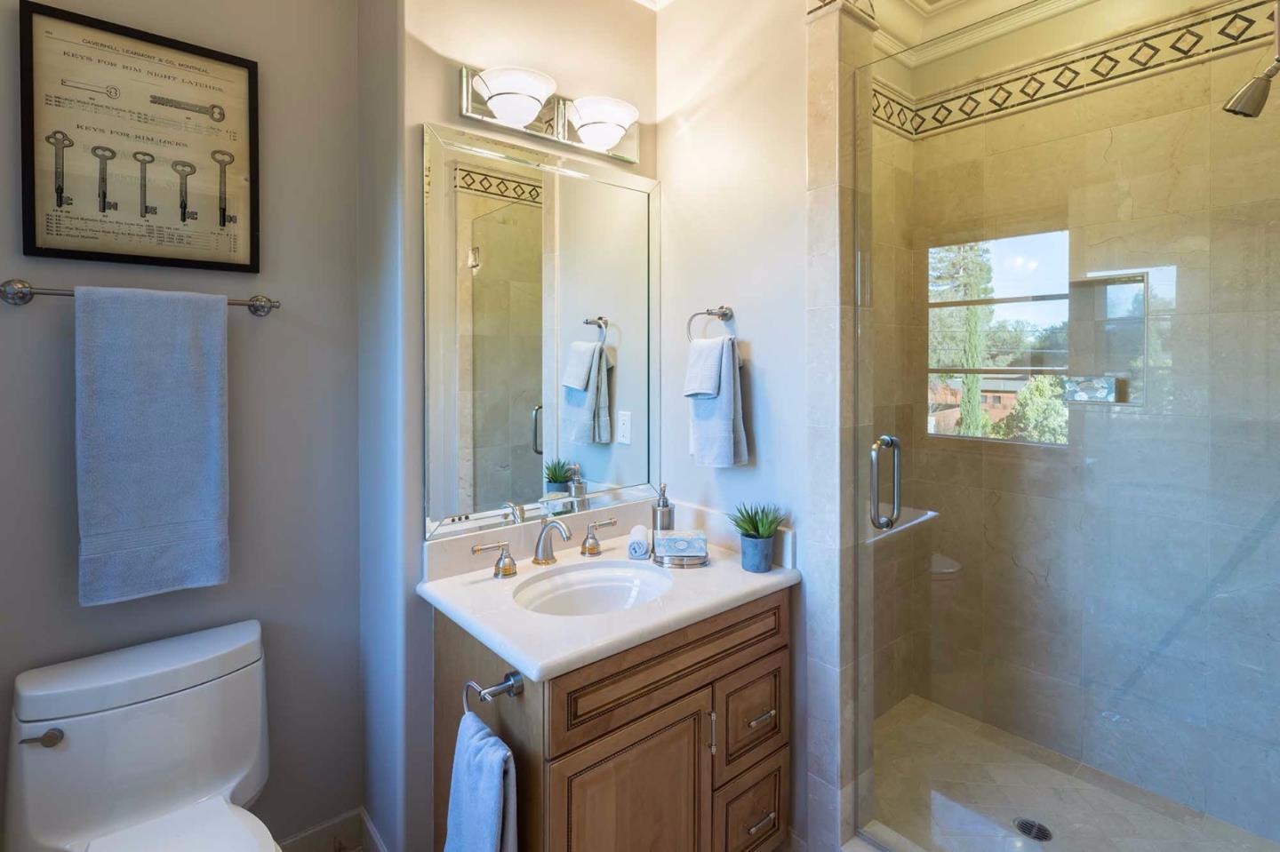 84 Nora Way Atherton, CA 94027 - Photo 21 of 37 a bathroom with a sink a toilet and shower