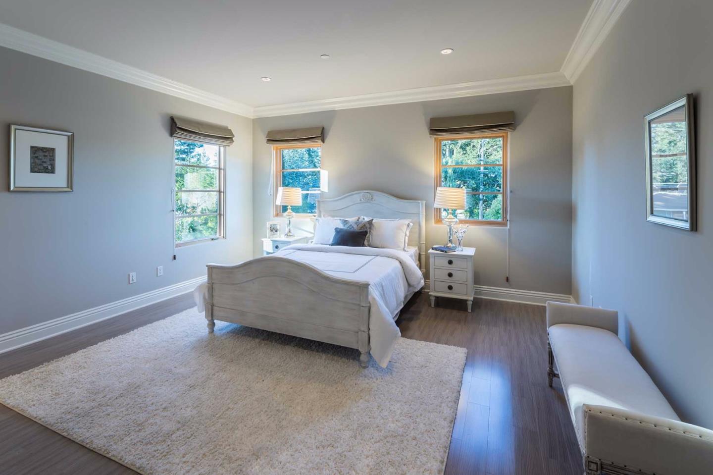 84 Nora Way Atherton, CA 94027 - Photo 22 of 37 a bedroom with a bed wooden floor and window