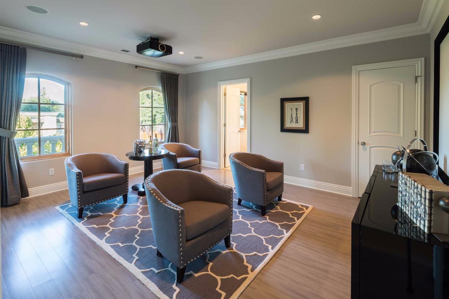 84 Nora Way Atherton, CA 94027 - Photo 23 of 37 a living room with furniture and a wooden floor
