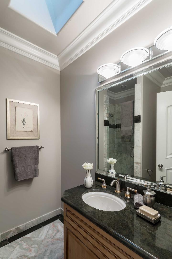 84 Nora Way Atherton, CA 94027 - Photo 26 of 37 a bathroom with a granite countertop sink a mirror and a