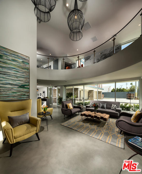 4140 Glencoe Avenue, Unit 604 Marina del Rey, CA 90292 - Photo 18 of 20 a living room with furniture kitchen view and a large window