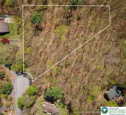 a view of balcony with wooden floor and fence