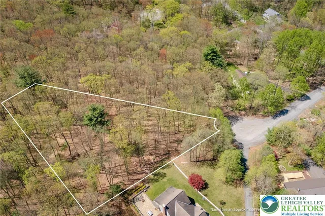 a view of a field with an outdoor space