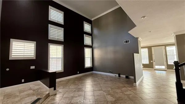 a view of a hallway with windows
