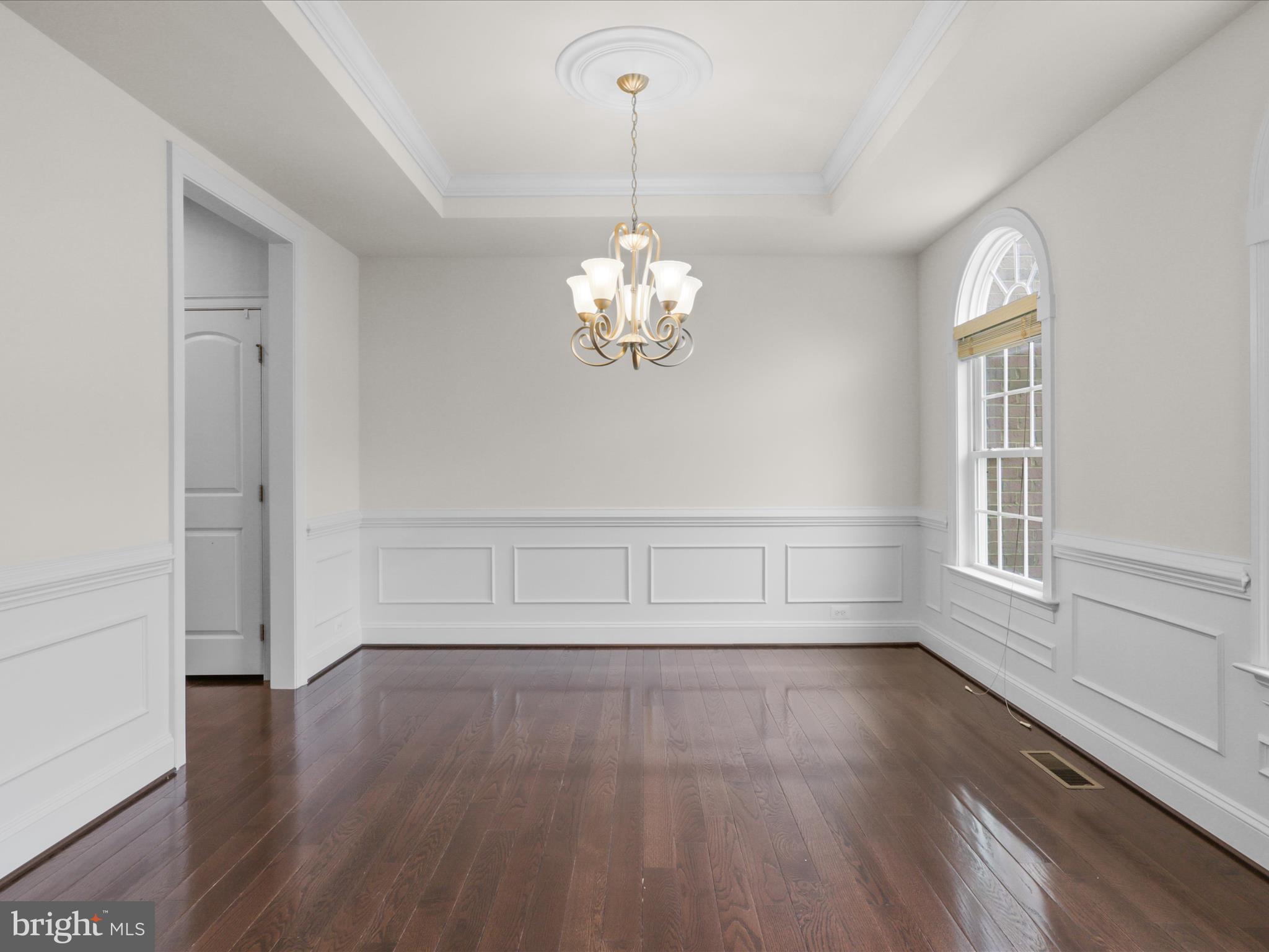 25138 Earlsdon Terrace Chantilly, VA 20152 - Photo 13 of 54 wooden floor in an empty room with a window