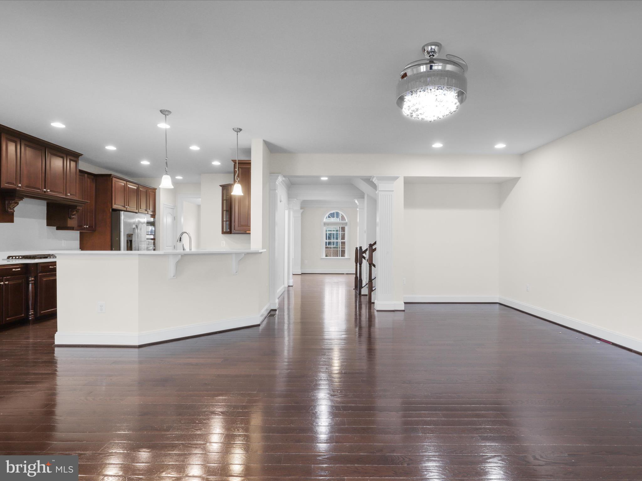 25138 Earlsdon Terrace Chantilly, VA 20152 - Photo 25 of 54 a view of kitchen with cabinets and wooden floor