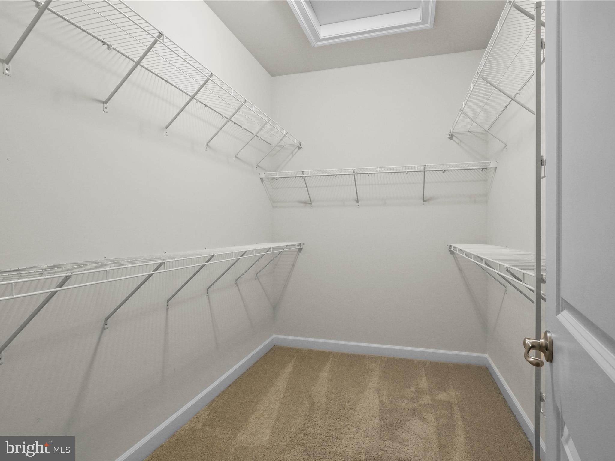 25138 Earlsdon Terrace Chantilly, VA 20152 - Photo 34 of 54 a view of a room with racks on the wall