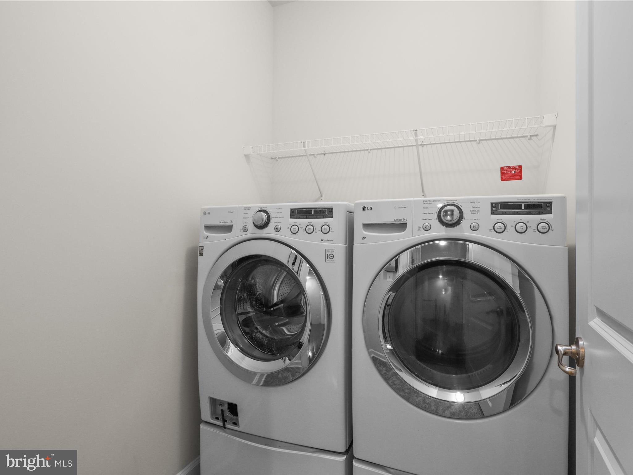 25138 Earlsdon Terrace Chantilly, VA 20152 - Photo 37 of 54 a utility room with dryer and washer