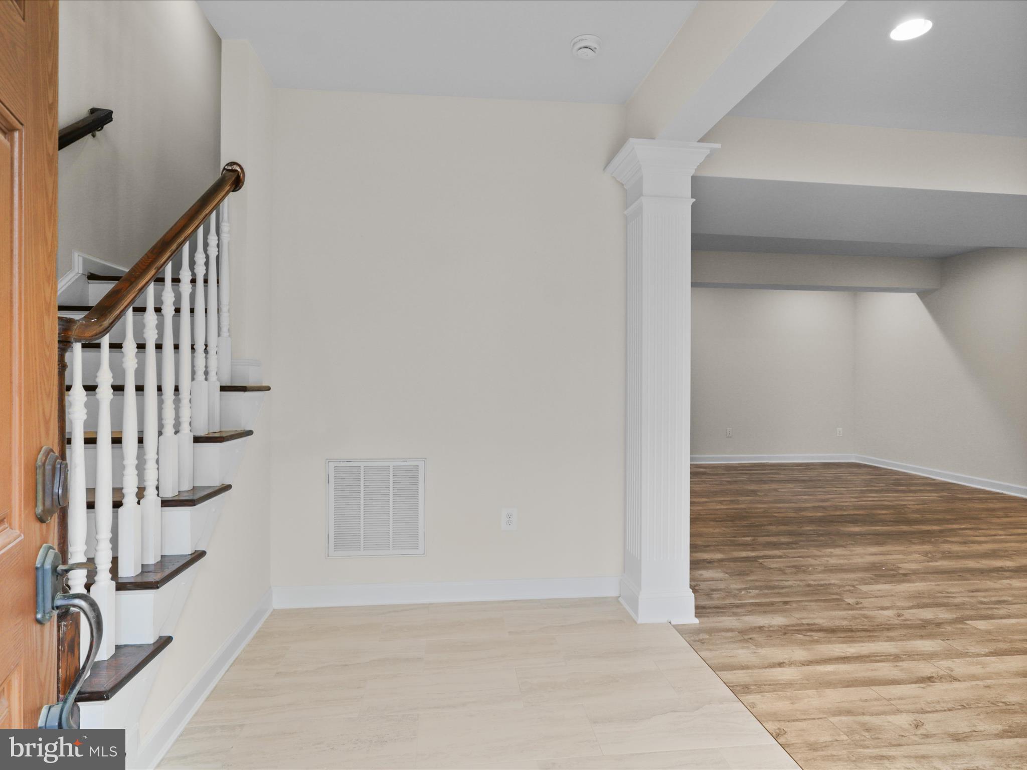 25138 Earlsdon Terrace Chantilly, VA 20152 - Photo 4 of 54 a view of an entryway with wooden floor