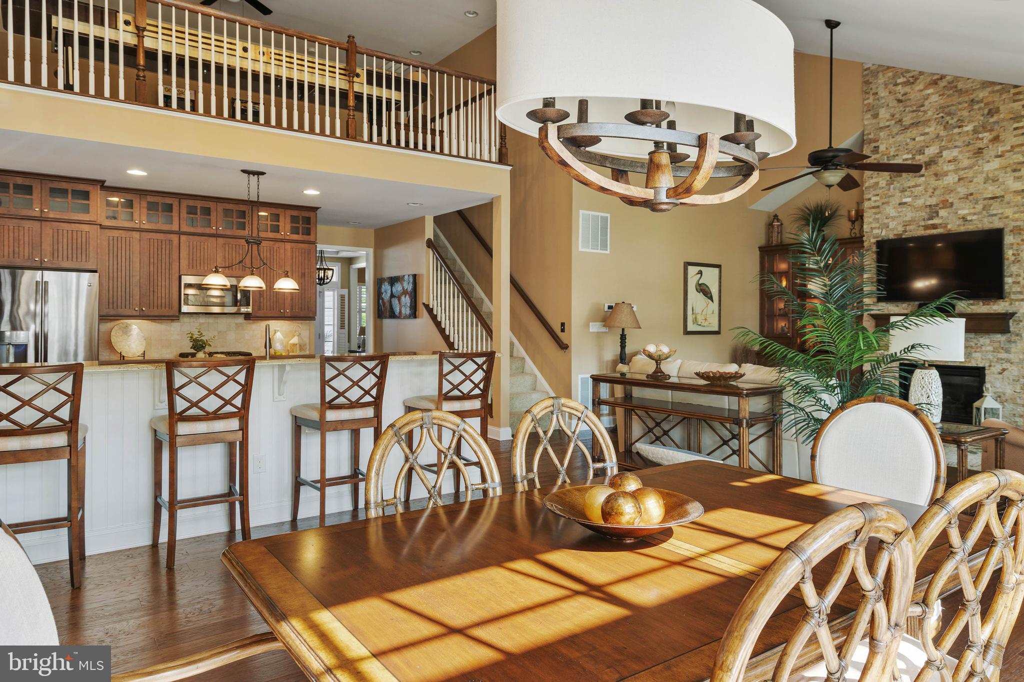 37058 Sheepscot Road Lewes, DE 19958 - Photo 15 of 51 View of Dining Room, kitchen & stairs to loft