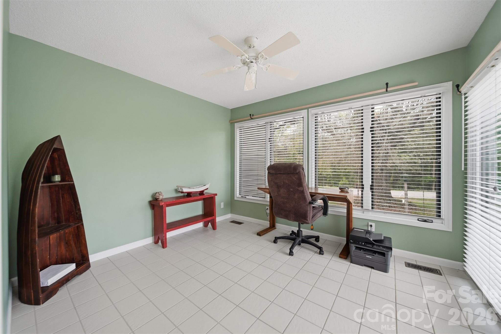 192 Reese Loop Taylorsville, NC 28681 - Photo 14 of 41 a view of a workspace with furniture and a window