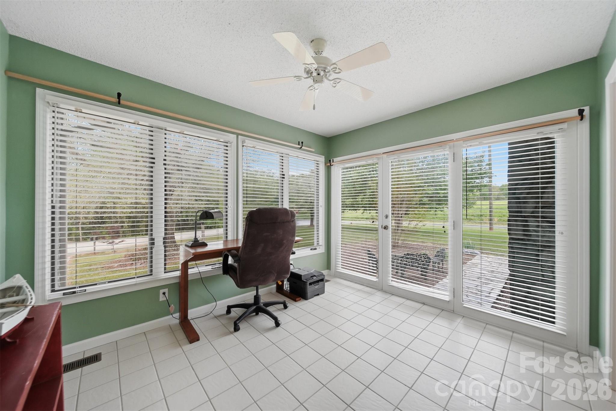 192 Reese Loop Taylorsville, NC 28681 - Photo 15 of 41 a view of a workspace with furniture and a window