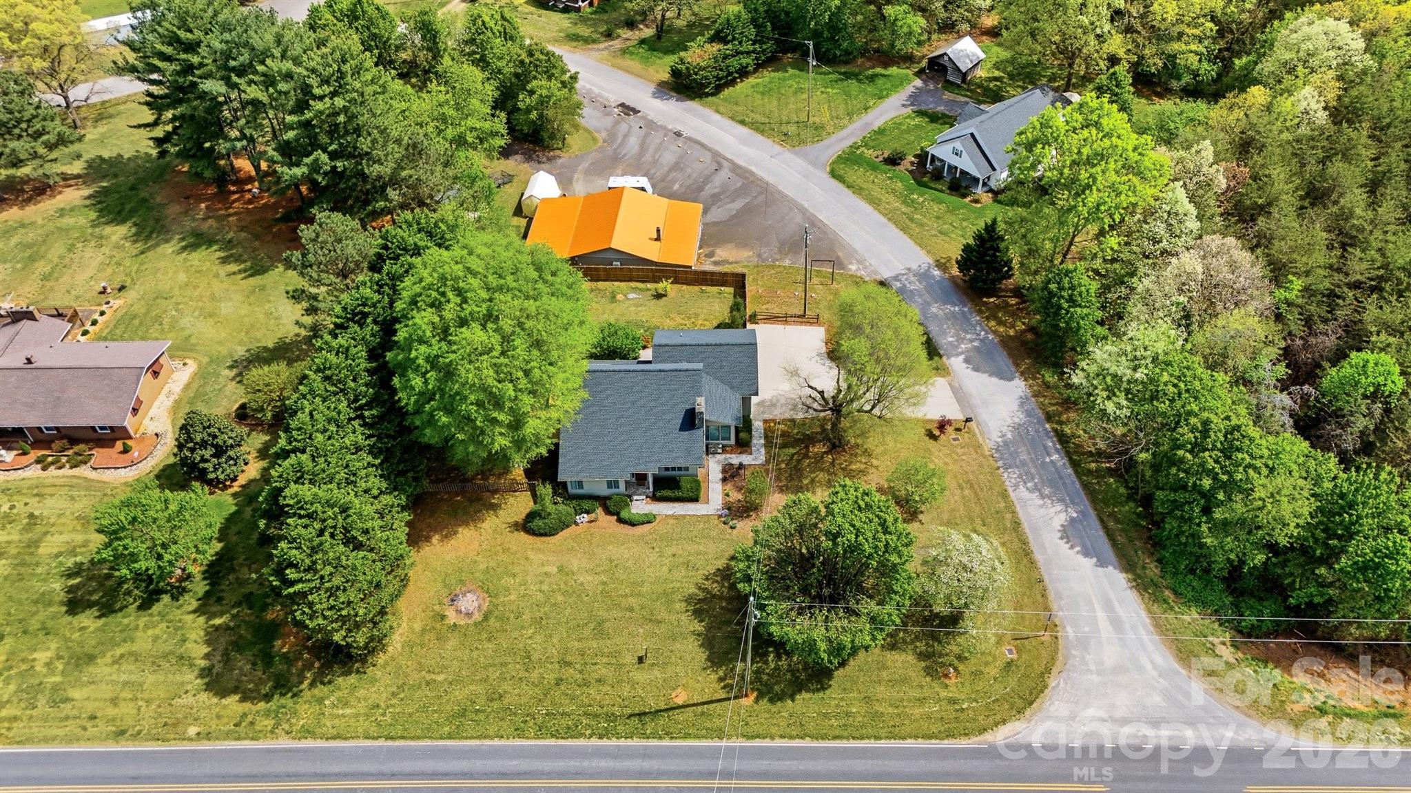 192 Reese Loop Taylorsville, NC 28681 - Photo 41 of 41 an aerial view of a house with a yard