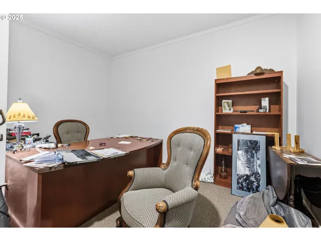 a bathroom with a sink toilet and mirror
