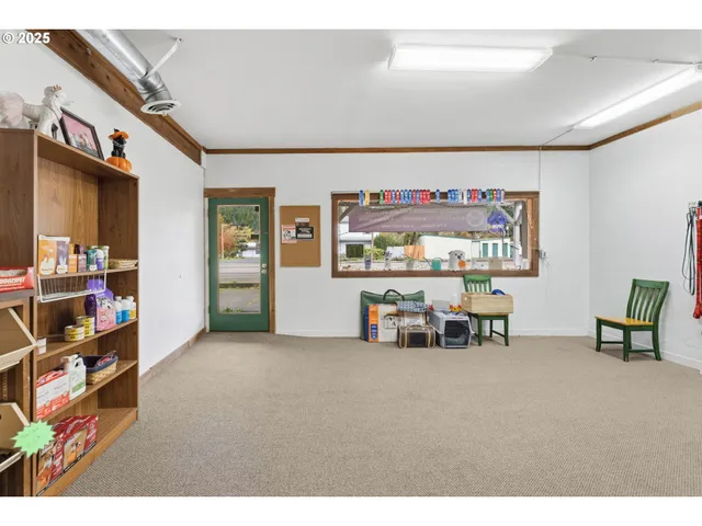 a workspace with furniture and wooden floor