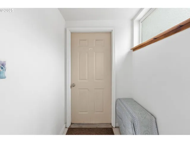 a kitchen with a sink cabinets and appliances