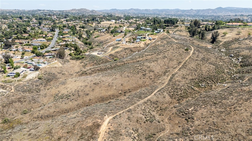 0 Apn, Unit 245080005 Riverside, CA 92506 - Photo 8 of 21 a view of a dry yard with mountains and green space