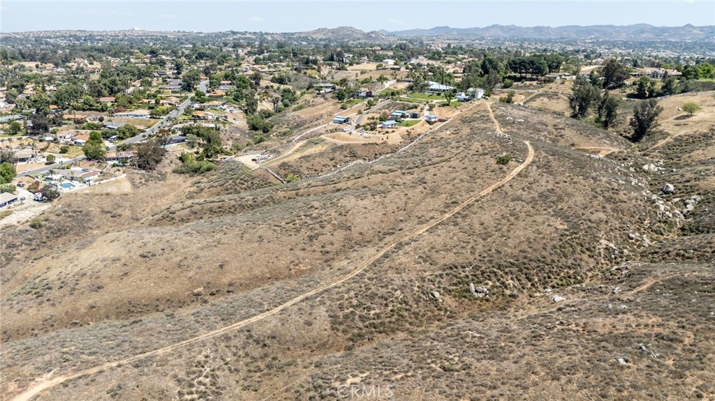 0 Apn, Unit 245080005 Riverside, CA 92506 - Photo 9 of 21 a view of a dry yard with trees