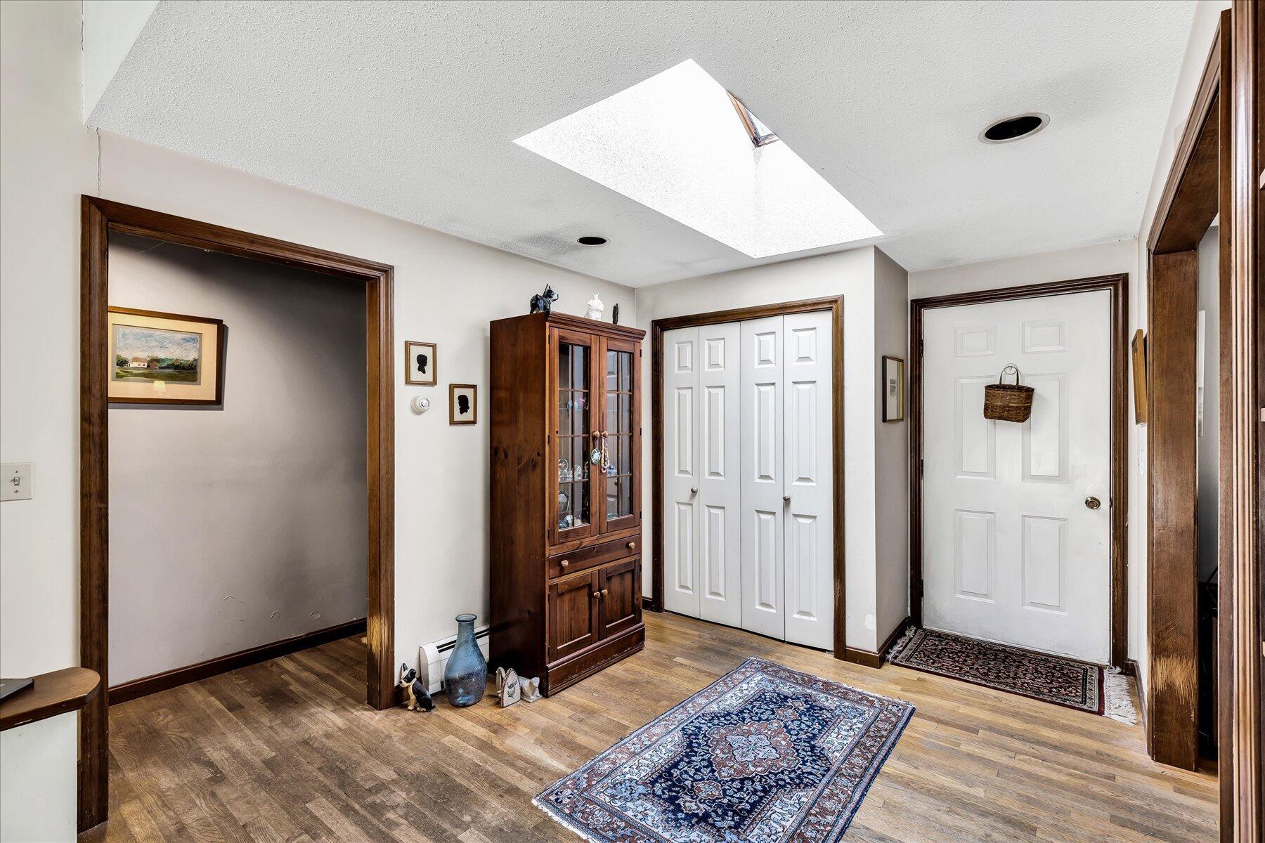 11 Barnacle Lane Mashpee, MA 02649 - Photo 13 of 38 a view of a livingroom with closet and door