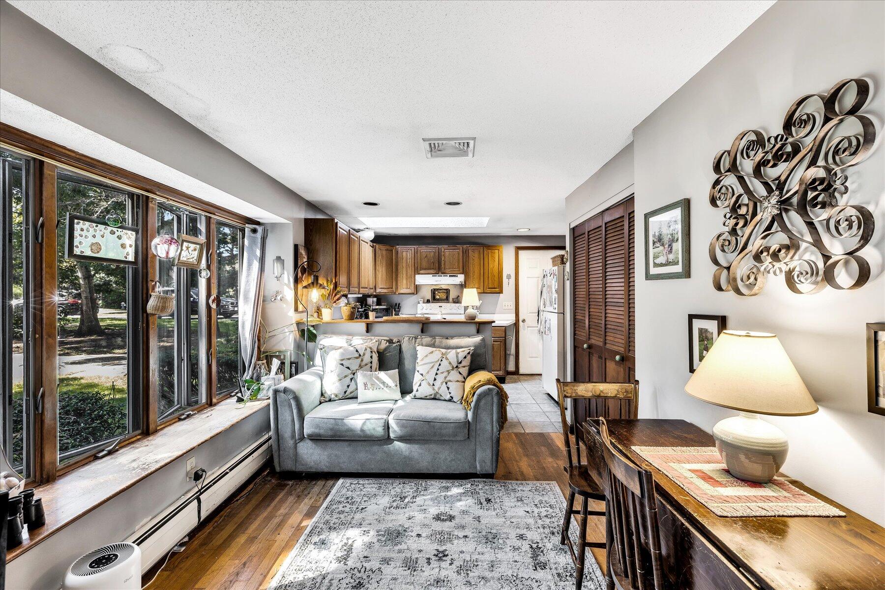 11 Barnacle Lane Mashpee, MA 02649 - Photo 14 of 38 a living room with furniture and a large window
