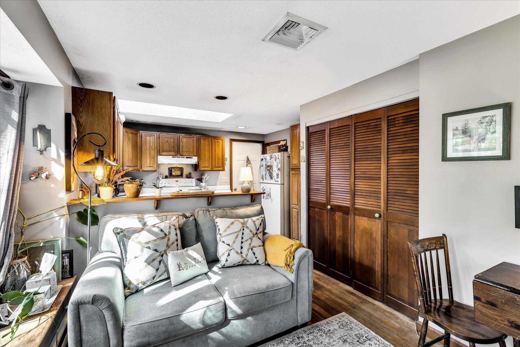 11 Barnacle Lane Mashpee, MA 02649 - Photo 16 of 38 a view of a livingroom with furniture and a window