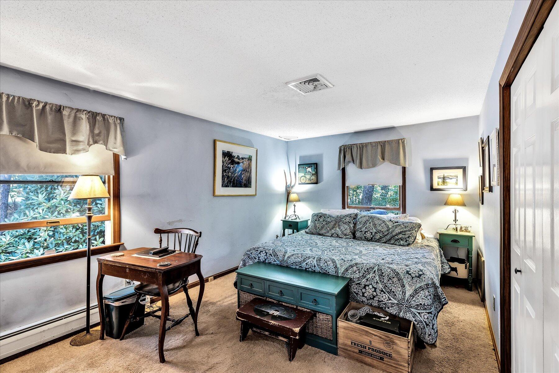 11 Barnacle Lane Mashpee, MA 02649 - Photo 23 of 38 a bedroom with a bed and a window