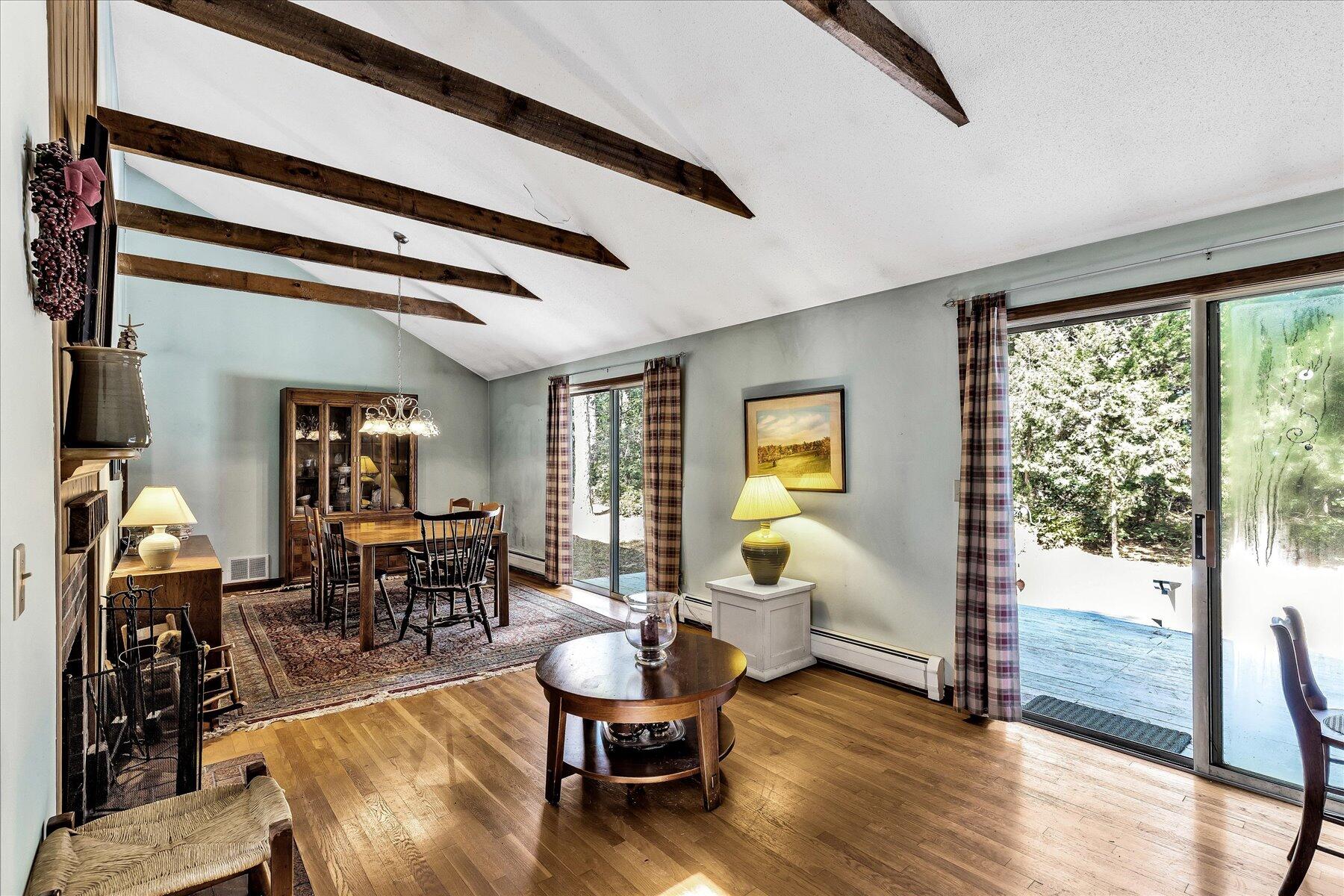 11 Barnacle Lane Mashpee, MA 02649 - Photo 4 of 38 a living room with furniture and wooden floor