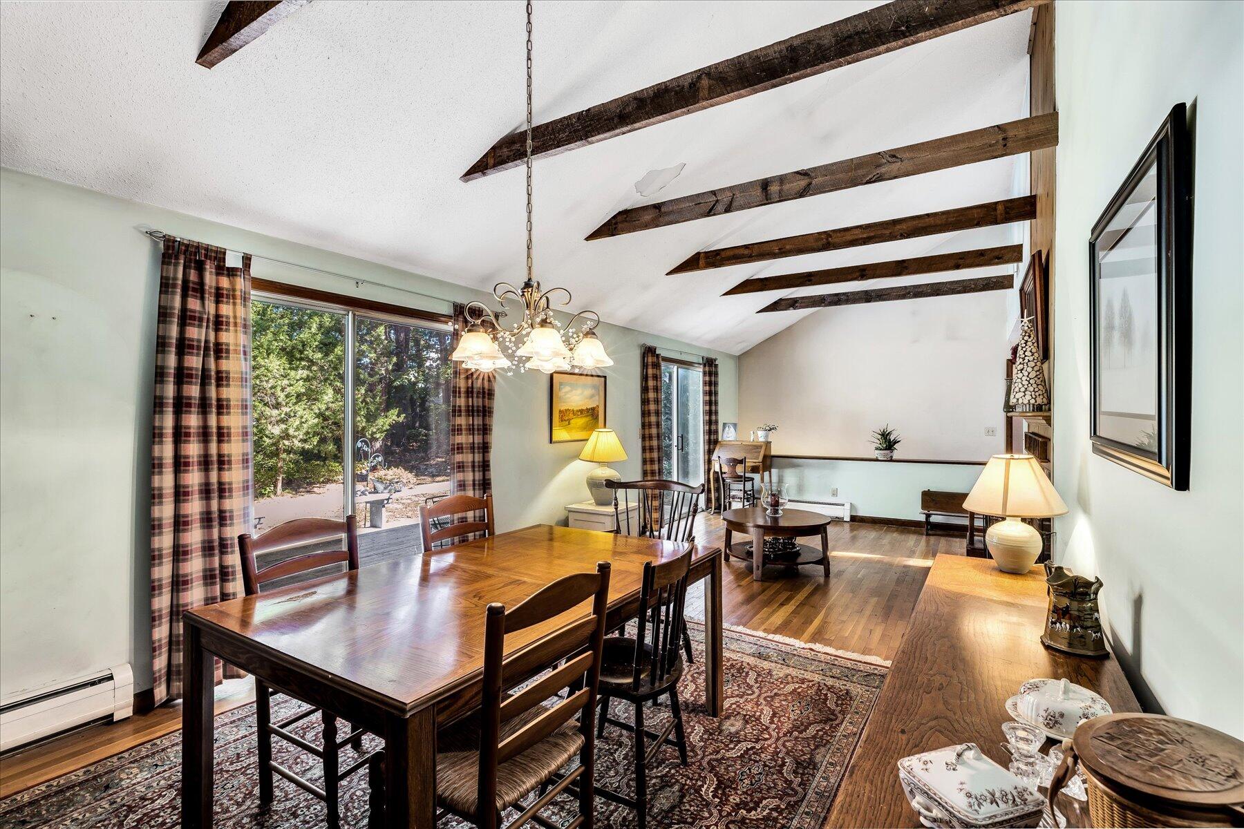 11 Barnacle Lane Mashpee, MA 02649 - Photo 9 of 38 a living room with furniture and a large window