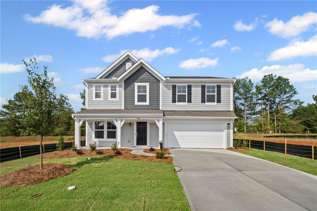 130 Cherry Gln Way Euharlee, GA 30145 - Photo 1 of 1 a front view of a house with garden