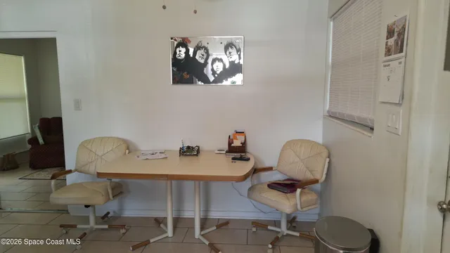 a view of a workspace with furniture