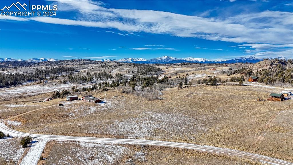 651 Warrior Circle Como, CO 80432 - Photo 2 of 25 a view of a dry yard with wooden fence