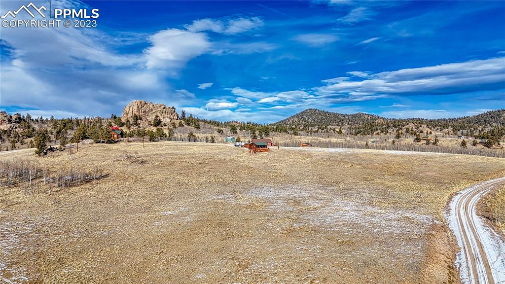 651 Warrior Circle Como, CO 80432 - Photo 7 of 25 a view of a lake with a mountain in the background