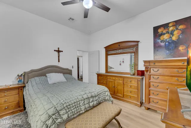 a bedroom with a bed and furniture