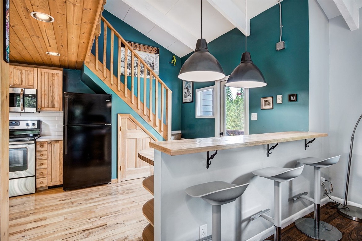 73 Illinois Gulch Road, Unit 8 Breckenridge, CO 80424 - Photo 8 of 24 a view of entryway and hall with wooden floor