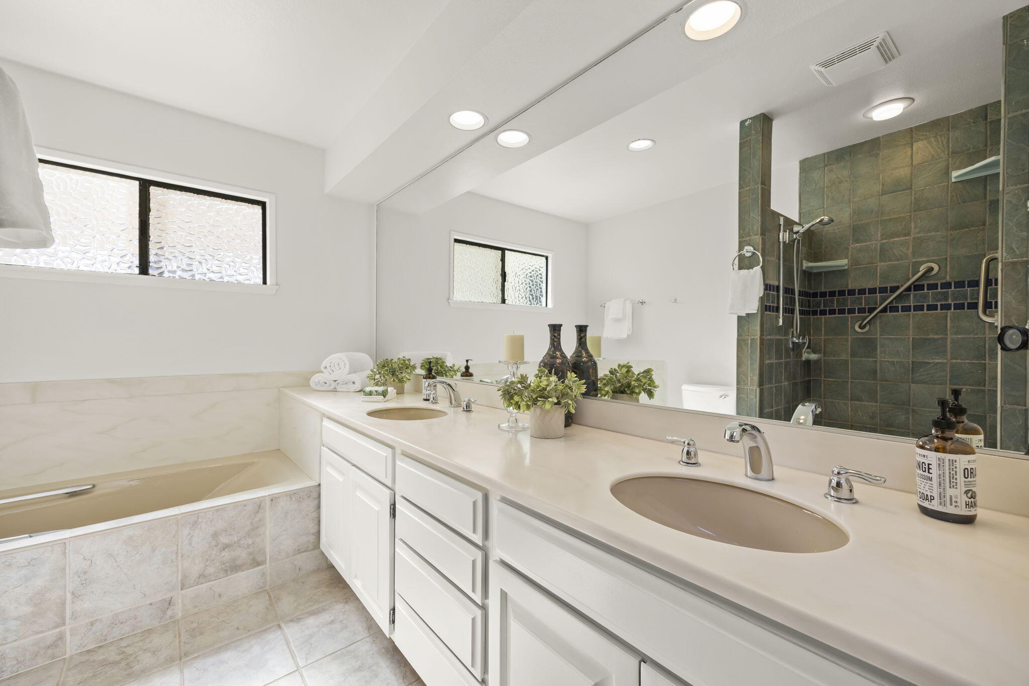 885 Oakwood Street Ojai, CA 93023 - Photo 24 of 35 a bathroom with a tub sink and mirror