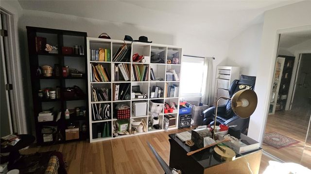 a living room with lots of furniture and a flat screen tv