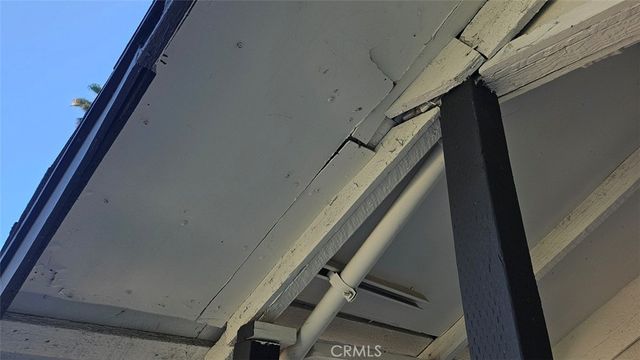 a view of a door and a window