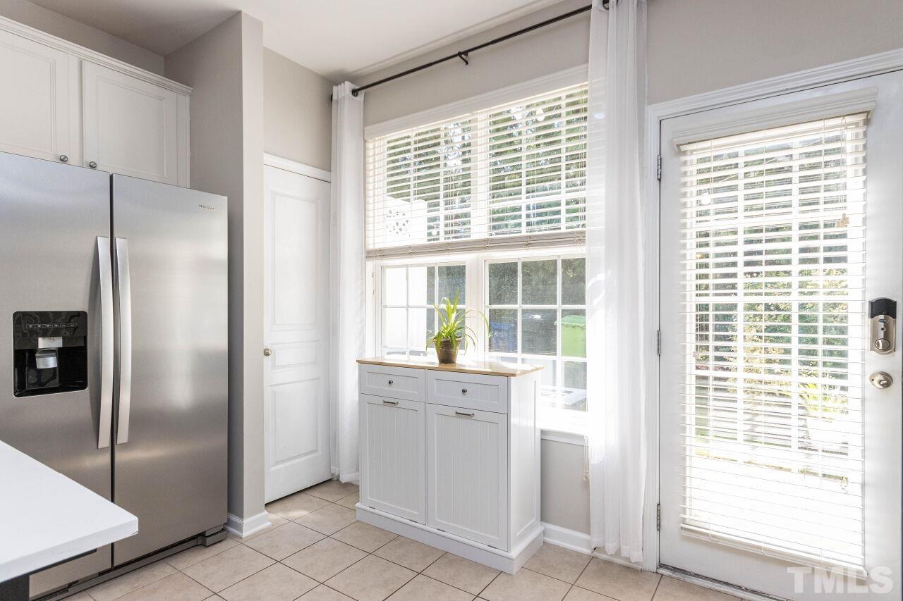 7863 Spungold Street Raleigh, NC 27617 - Photo 12 of 34 a view of a kitchen with a window