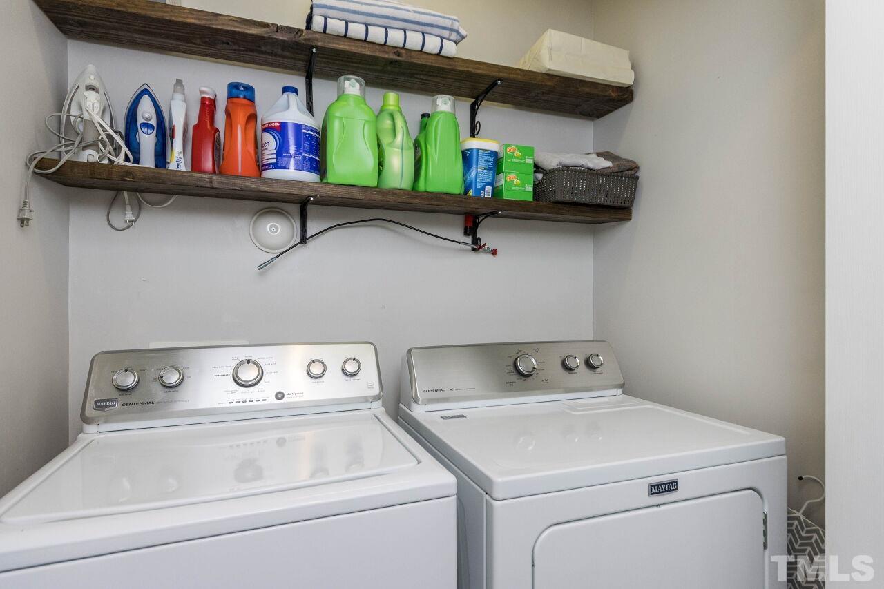 7863 Spungold Street Raleigh, NC 27617 - Photo 24 of 34 a utility room with dryer and washer