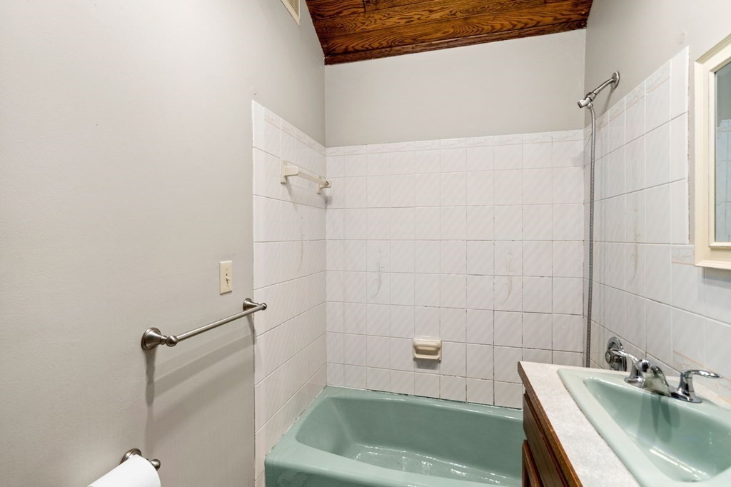 3 Old English Road Worcester, MA 01609 - Photo 16 of 36 a bathroom with a sink a bathtub and shower