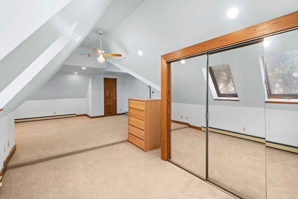 3 Old English Road Worcester, MA 01609 - Photo 19 of 36 en empty room with wooden floor and window