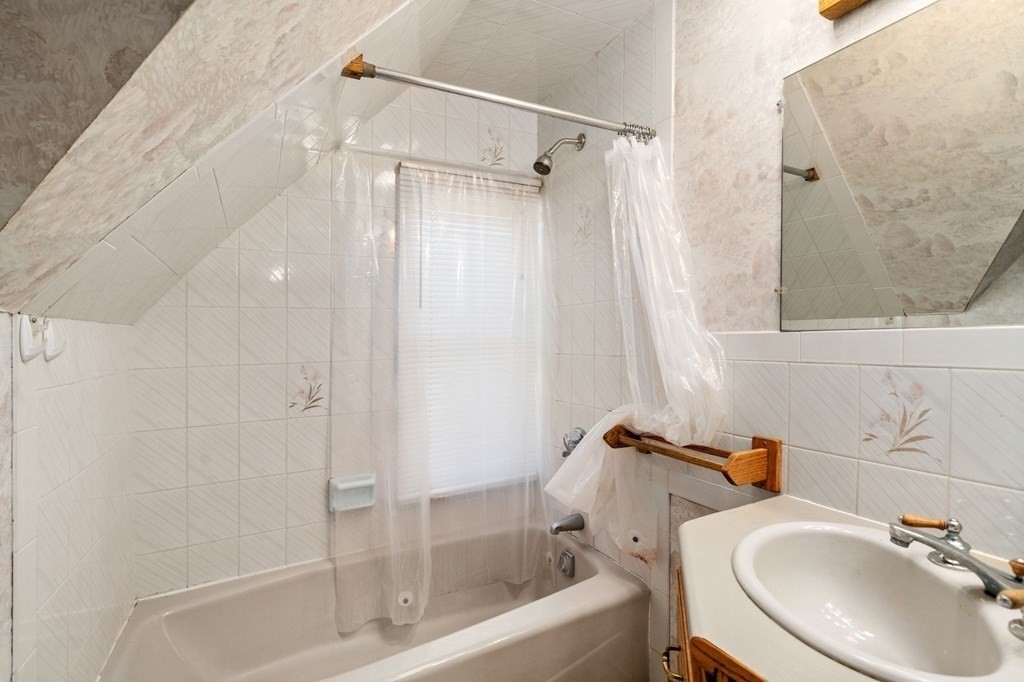 3 Old English Road Worcester, MA 01609 - Photo 20 of 36 a bathroom with a sink and a mirror