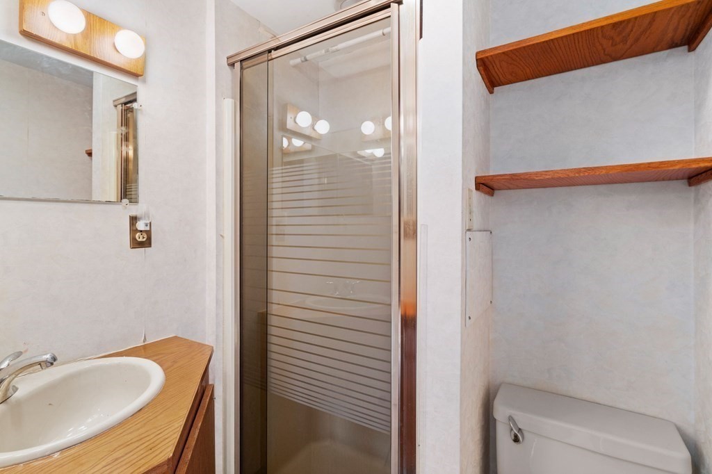 3 Old English Road Worcester, MA 01609 - Photo 25 of 36 a bathroom with a tub and shower